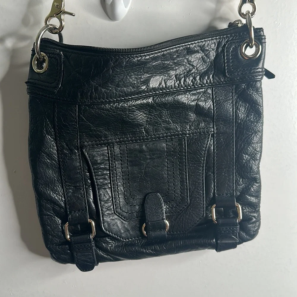 The Saks black leather cross body bag